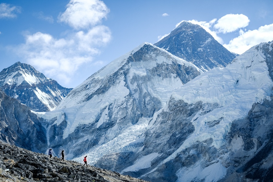 Hikers with Mt Everest on the Everest Base Camp Trek in Nepal